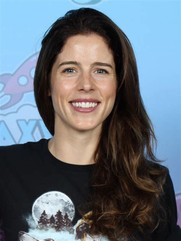 Unveil The Marital Status Of Emily Bett Rickards: Unraveling The Enigma