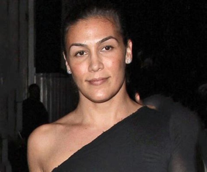 What does Nicole Young do for a living? Who was Dr Dre first wife? How much does Dre pay his ex-wife